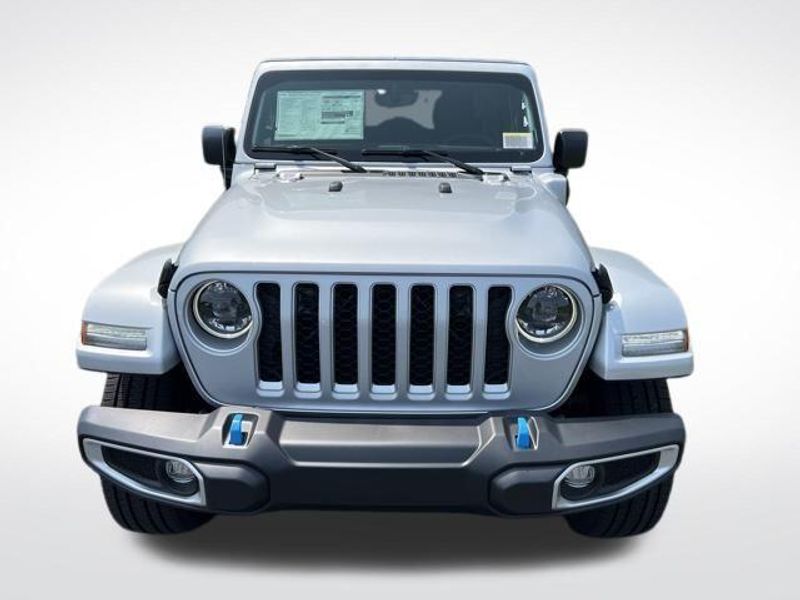 2023 Jeep Wrangler Sahara 4xe in a Silver Zynith Clear Coat exterior color and Blackinterior. Lakeshore CDJR Seaford 302-213-6058 lakeshorecdjr.com 