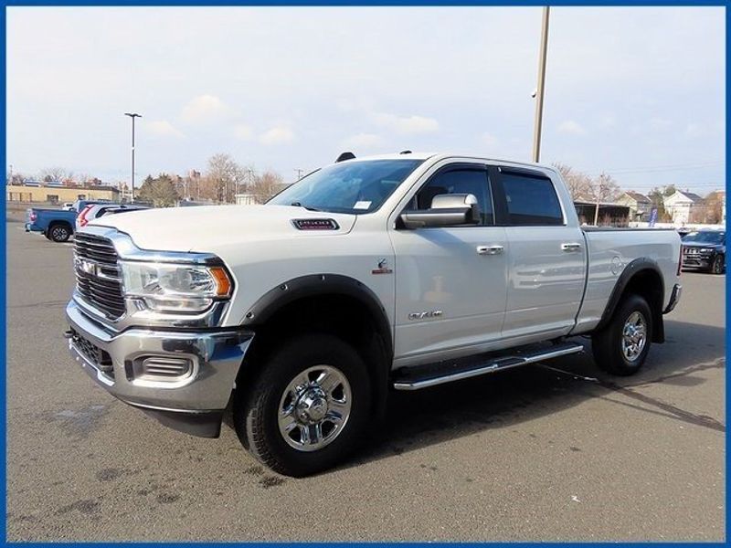 2019 RAM 2500 Big Horn in a Bright White Clear Coat exterior color and Blackinterior. Papas Jeep Ram In New Britain, CT 860-356-0523 papasjeepram.com 