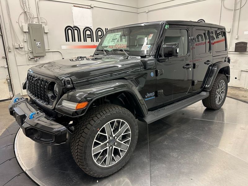 2024 Jeep Wrangler 4-door High Altitude 4xe in a Black Clear Coat exterior color and Green/Blackinterior. Marina Auto Group (855) 564-8688 marinaautogroup.com 