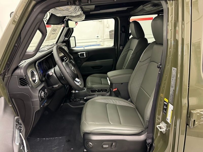 2024 Jeep Wrangler 4-door High Altitude 4xe in a Sarge Green Clear Coat exterior color and Green/Blackinterior. Marina Auto Group (855) 564-8688 marinaautogroup.com 