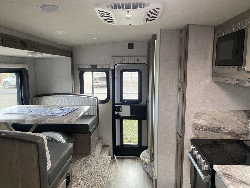 2024 ARCTIC FOX 990  in a MOON STONE exterior color. Legacy Powersports 541-663-1111 legacypowersports.net 