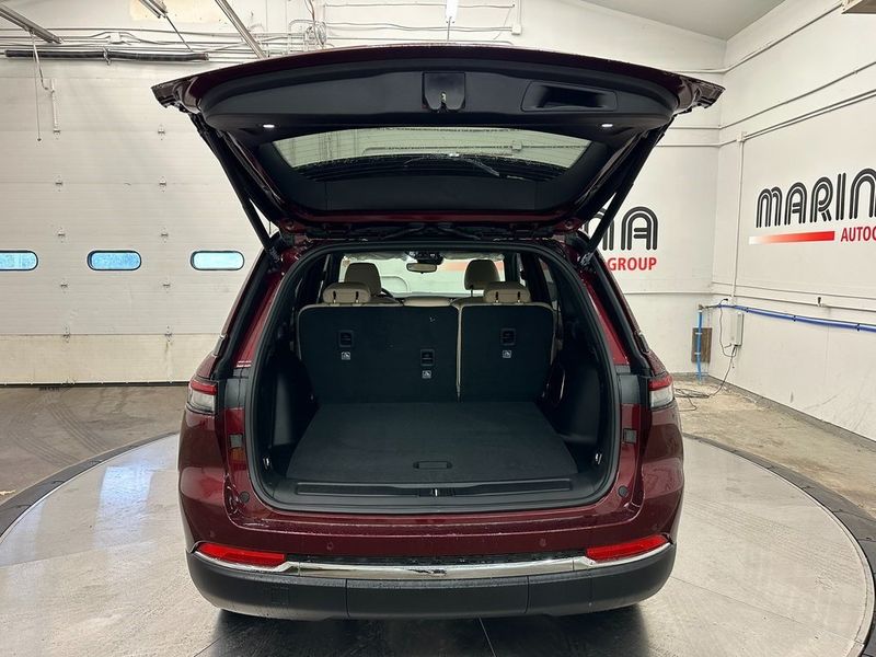 2024 Jeep Grand Cherokee 4xe in a Velvet Red Pearl Coat exterior color and Wicker Beige/Global Blackinterior. Marina Auto Group (855) 564-8688 marinaautogroup.com 