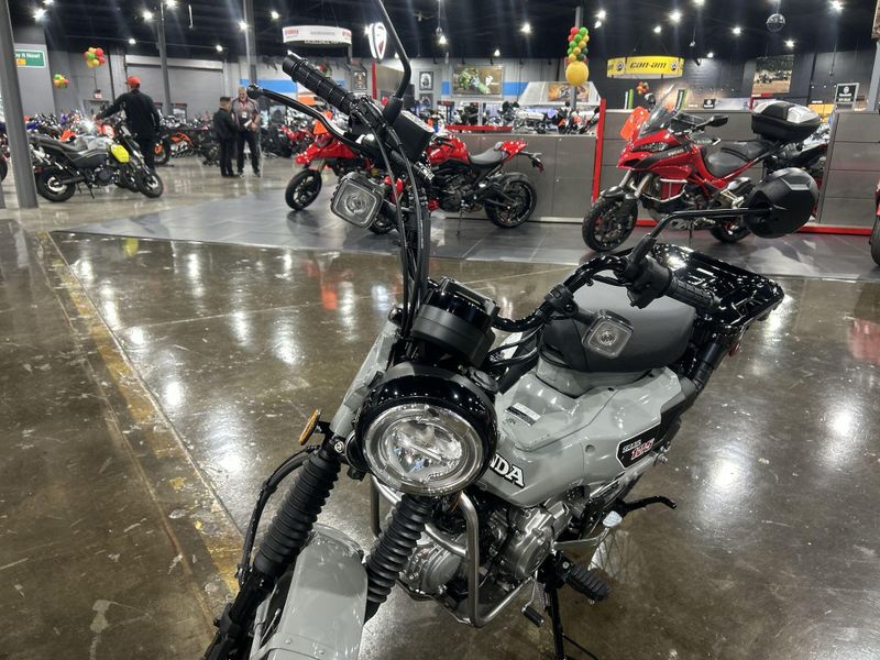 2025 Honda TRAIL 125  in a PEARL SMOKY GRAY exterior color. Del Amo Motorsports of Redondo Beach (424) 390-7811 delamomotorsports.com 