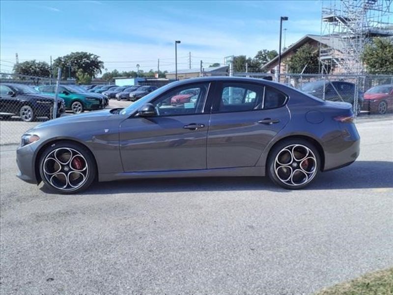 2024 Alfa Romeo Giulia Ti in a Vesuvio Gray Metallic exterior color and Blackinterior. Northside Imports Houston 281-475-4549 northsideimportshouston.com 