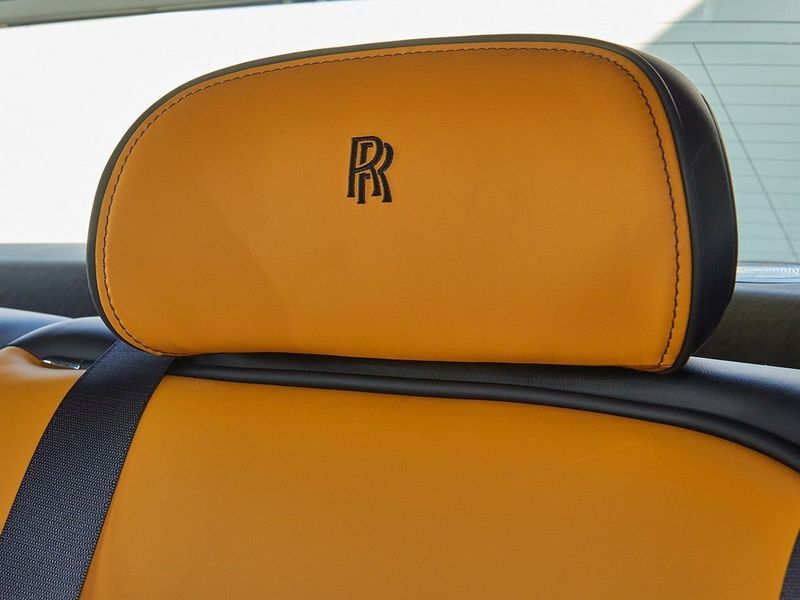 2024 Rolls-Royce Ghost  in a Gunmetal exterior color and Forge Yellowinterior. SHELLY AUTOMOTIVE shellyautomotive.com 