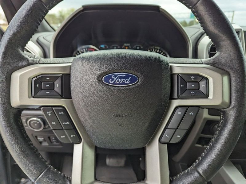 2020 Ford F-150 Lariat in a Magnetic Metallic exterior color and Blackinterior. Johnson Dodge 601-693-6343 pixelmotiondemo.com 