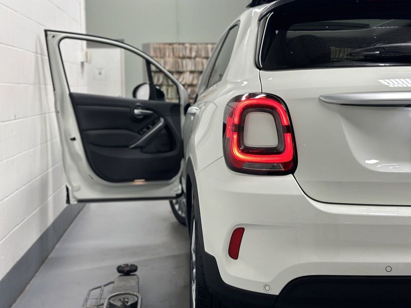 2023 Fiat 500x Pop Awd in a Bianco Gelato (White Clear Coat) exterior color and Blackinterior. Schmelz Countryside Alfa Romeo and Fiat (651) 968-0556 schmelzfiat.com 