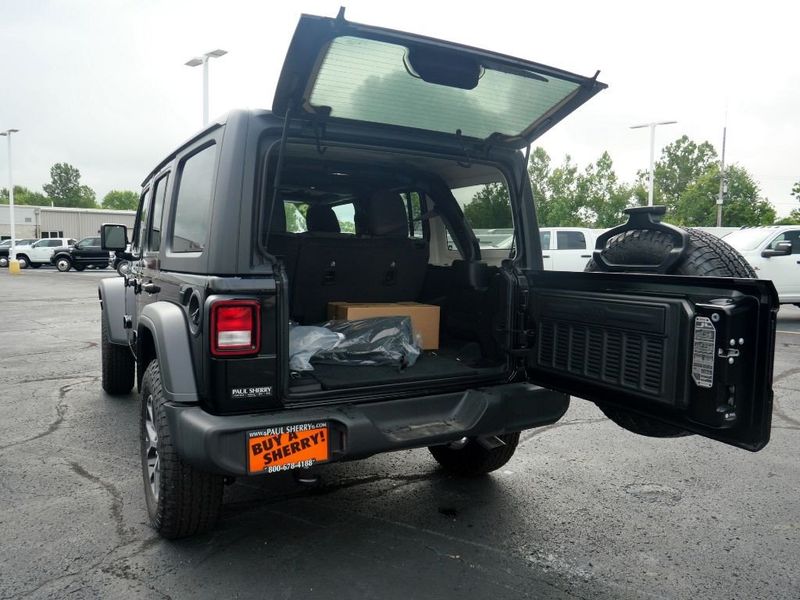 2024 Jeep Wrangler 4-door Sport S in a Black Clear Coat exterior color and Blackinterior. Paul Sherry Chrysler Dodge Jeep RAM (937) 749-7061 sherrychrysler.net 