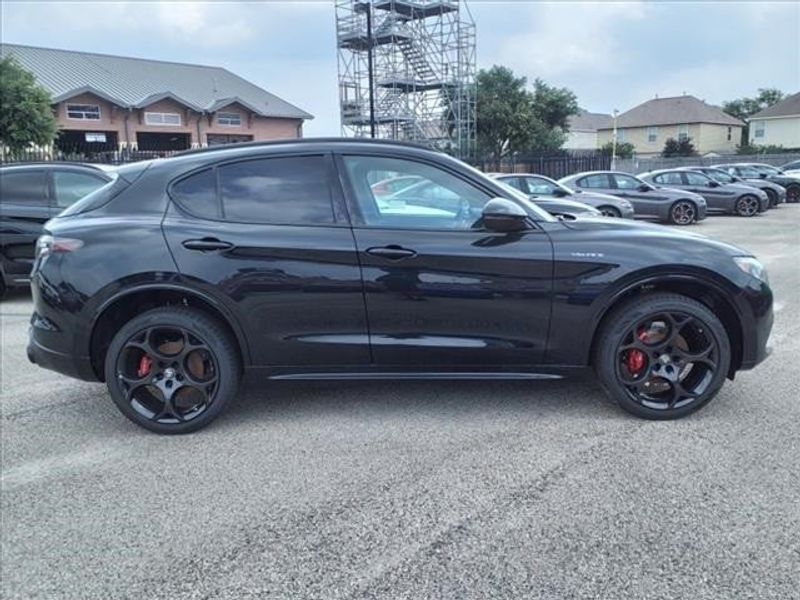 2024 Alfa Romeo Stelvio Veloce in a Vulcano Black Metallic exterior color and Blackinterior. Northside Imports Houston 281-475-4549 northsideimportshouston.com 