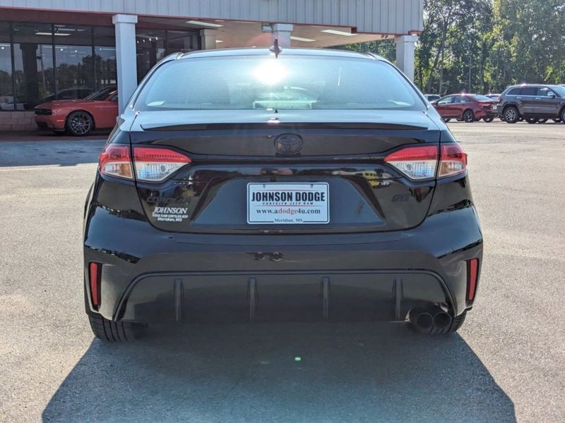 2023 Toyota Corolla SE in a Midnight Black Metallic exterior color and Black/Redinterior. Johnson Dodge 601-693-6343 pixelmotiondemo.com 