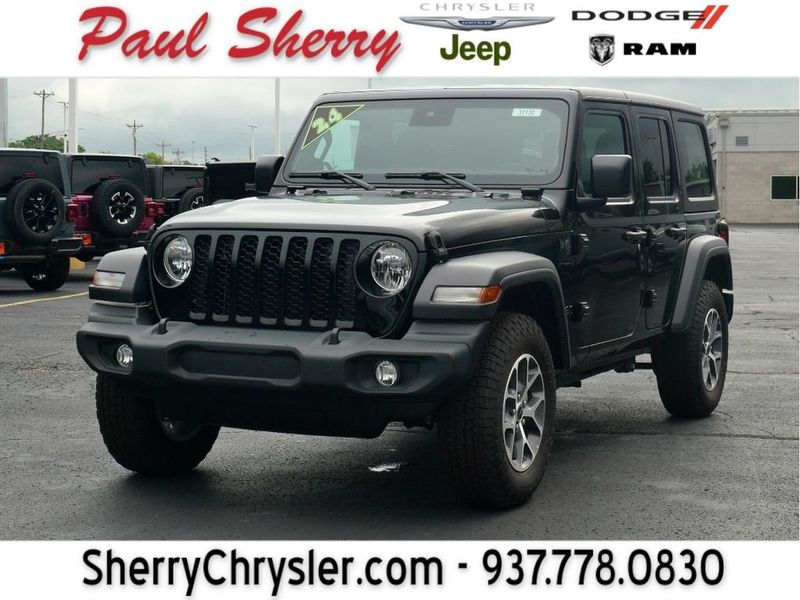 2024 Jeep Wrangler 4-door Sport S in a Black Clear Coat exterior color and Blackinterior. Paul Sherry Chrysler Dodge Jeep RAM (937) 749-7061 sherrychrysler.net 