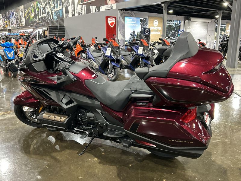 2025 Honda GOLDWING TOUR AIR BAG DCT  in a BORDEAUX RED METALLIC exterior color. Del Amo Motorsports of Redondo Beach (424) 390-7811 delamomotorsports.com 