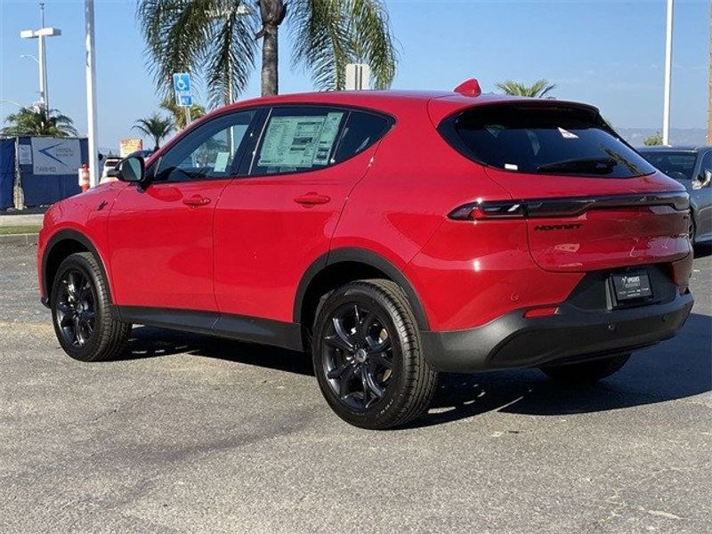 2023 Dodge Hornet Gt Awd in a Hot Tamale exterior color and Blackinterior. McPeek