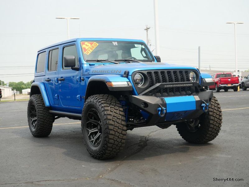 2023 Jeep Wrangler Rubicon 4xe in a Hydro Blue Pearl Coat exterior color and Black/Dark Saddleinterior. Paul Sherry Chrysler Dodge Jeep RAM (937) 749-7061 sherrychrysler.net 