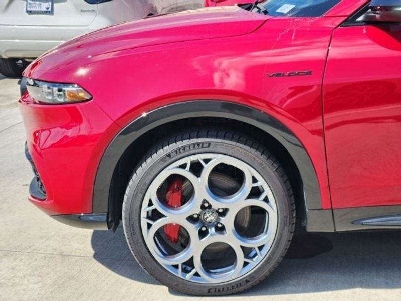 2024 Alfa Romeo Tonale Veloce Eawd in a Alfa Rosso (Red) exterior color and Blackinterior. Northside Alfa Romeo of Houston 281-475-4549 alfaromeousaofnorthhouston.com 