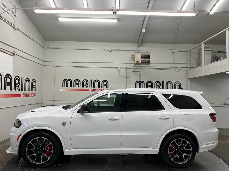 2023 Dodge Durango Srt Hellcat Plus Awd in a White Knuckle Clear Coat exterior color and Demonic Red/Blackinterior. Marina Auto Group (855) 564-8688 marinaautogroup.com 