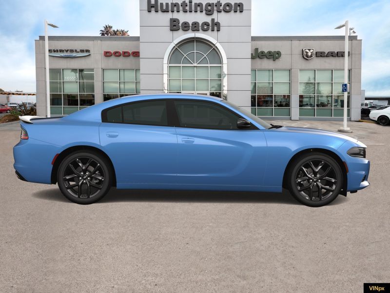 2023 Dodge Charger SXT in a Frostbite exterior color and Blackinterior. BEACH BLVD OF CARS beachblvdofcars.com 