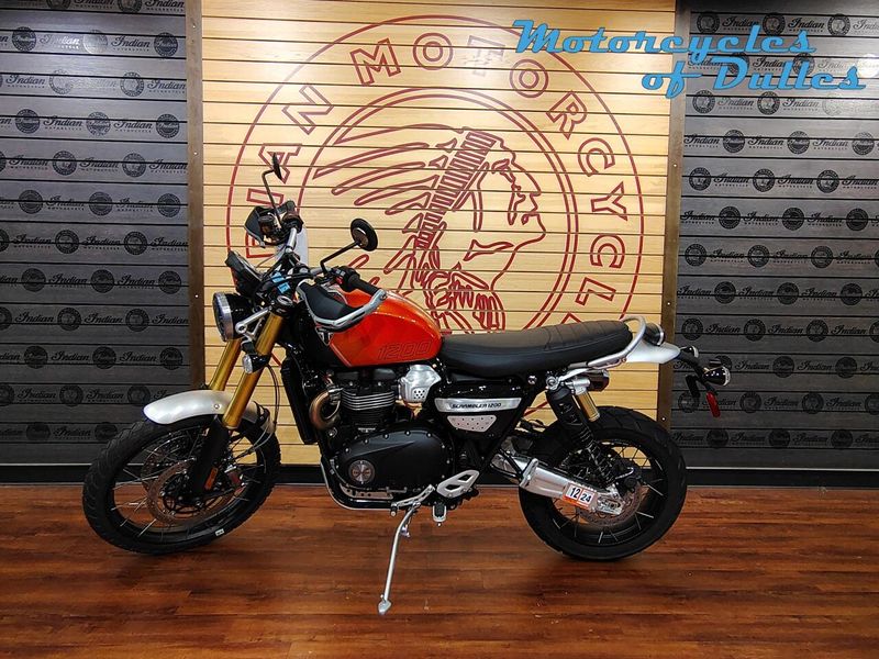 2024 Triumph Scrambler 1200 XE  in a Baja Orange/Phantom Black exterior color. Motorcycles of Dulles 571.934.4450 motorcyclesofdulles.com 