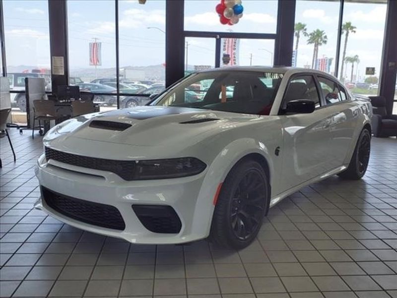 2023 Dodge Charger SRT Hellcat Widebody in a White Knuckle Clear Coat exterior color and Blackinterior. Perris Valley Auto Center 951-657-6100 perrisvalleyautocenter.com 
