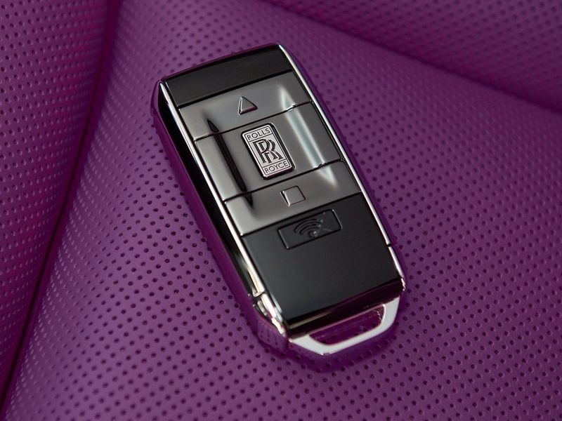 2024 Rolls-Royce Spectre  in a Twilight Purple exterior color and Arctic Whiteinterior. SHELLY AUTOMOTIVE shellyautomotive.com 