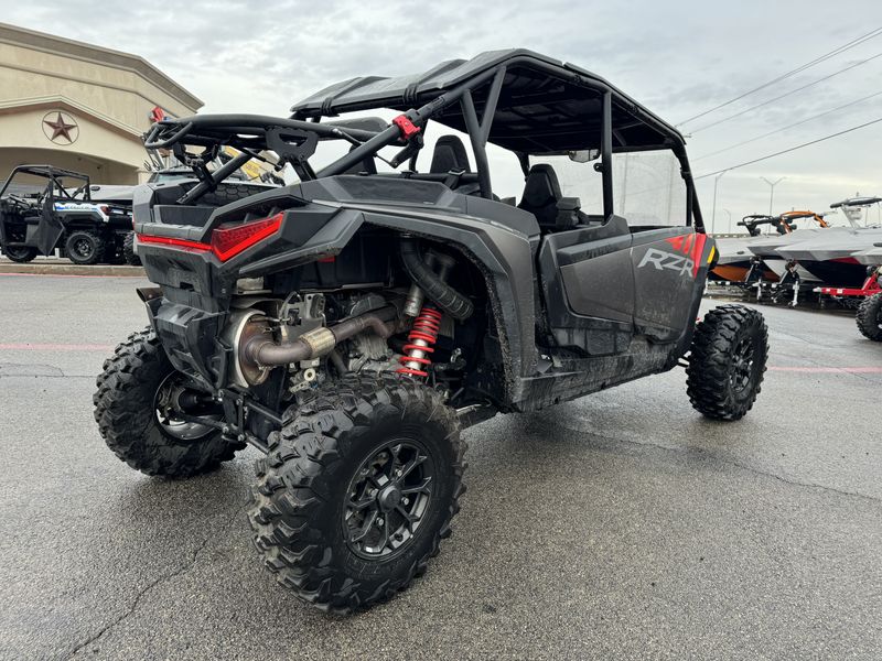 2024 POLARIS RZR XP 4 1000 ULTIMATE in a RED exterior color. Family PowerSports (877) 886-1997 familypowersports.com 