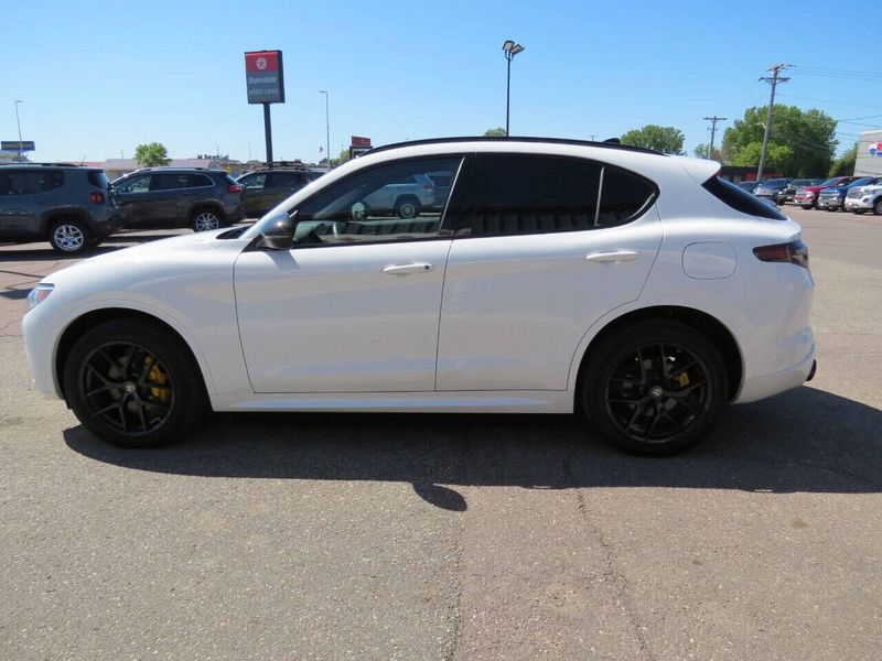 2021 Alfa Romeo Stelvio Ti Sport AWD 4dr Crossover in a White exterior color and Blackinterior. Militello Motors ​507-200-4344 militellomotors.net 