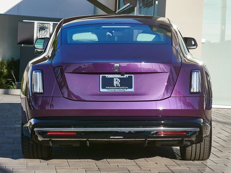 2024 Rolls-Royce Spectre  in a Twilight Purple exterior color and Arctic Whiteinterior. SHELLY AUTOMOTIVE shellyautomotive.com 