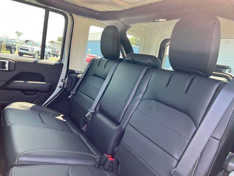 2023 Jeep Wrangler Sahara 4xe in a Silver Zynith Clear Coat exterior color and Blackinterior. Lakeshore CDJR Seaford 302-213-6058 lakeshorecdjr.com 