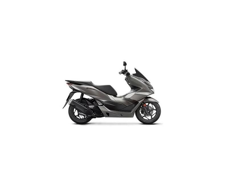 2023 Honda PCX in a Matte Brown Met exterior color. Greater Boston Motorsports 781-583-1799 pixelmotiondemo.com 
