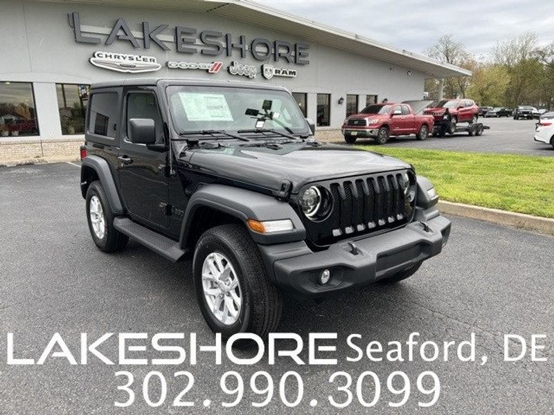 2023 Jeep Wrangler 2-door Sport S 4x4 in a Black Clear Coat exterior color and Blackinterior. Lakeshore CDJR Seaford 302-213-6058 lakeshorecdjr.com 