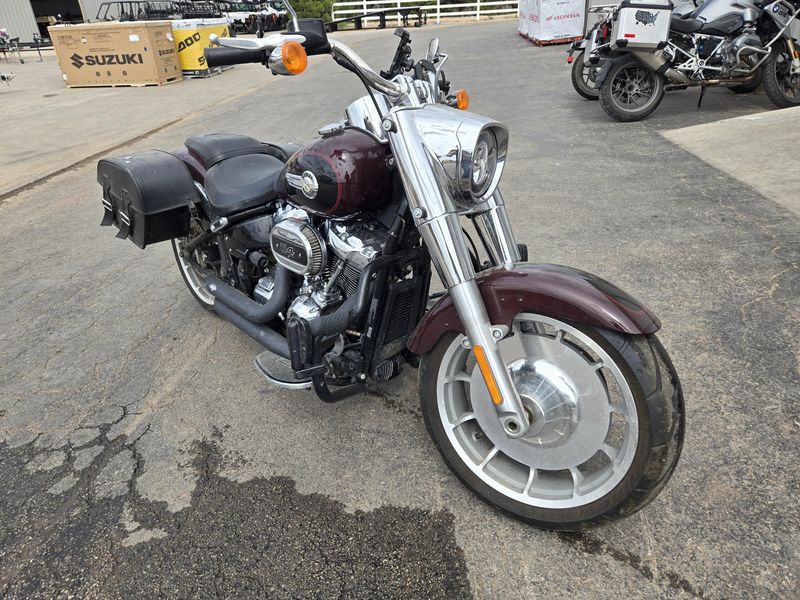 USED 2022 HARLEY SOFT TAIL FAT BOY 114 MIDNIGHT CRIMSON AND VIVID BLACK Image 1