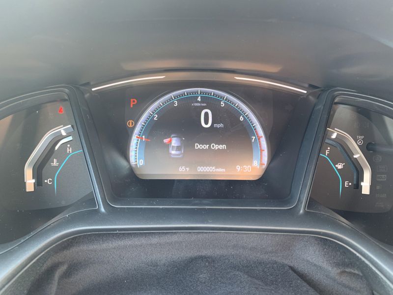 2020 Honda Civic Sedan LX in a White exterior color. BEACH BLVD OF CARS beachblvdofcars.com 