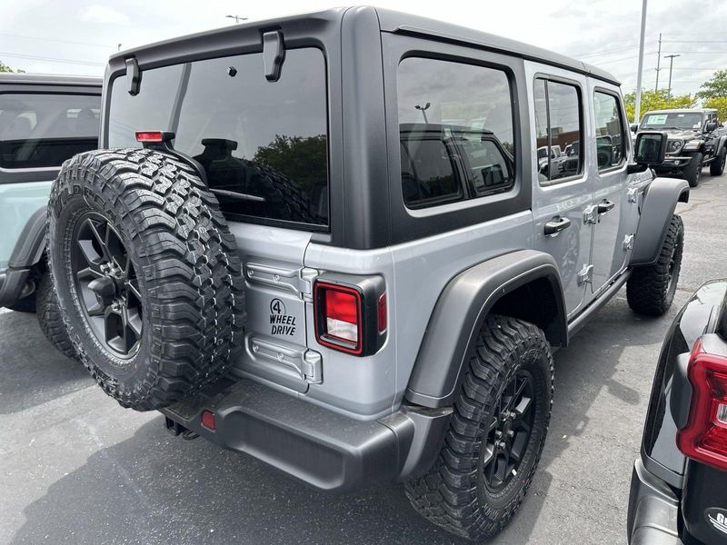 2024 Jeep Wrangler 4-door Willys in a Silver Zynith Clear Coat exterior color and Blackinterior. Gupton Motors Inc 615-384-2886 guptonmotors.com 