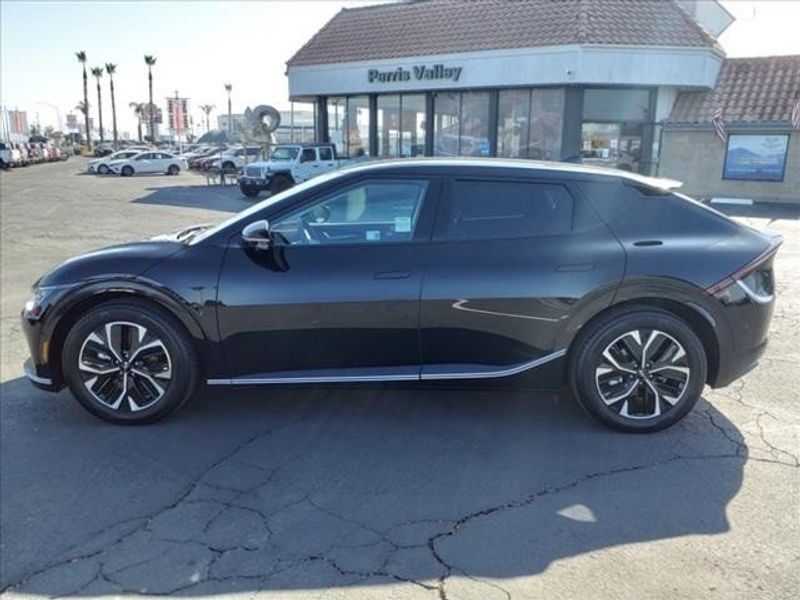 2023 Kia EV6 Wind in a Aurora Black Pearl exterior color and Charcoal/Misty Grayinterior. Perris Valley Auto Center 951-657-6100 perrisvalleyautocenter.com 