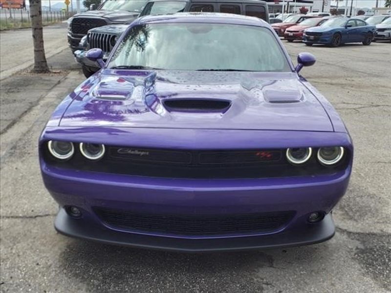 2023 Dodge Challenger R/T Scat Pack in a Plum Crazy Pearl Coat exterior color and Blackinterior. Perris Valley Auto Center 951-657-6100 perrisvalleyautocenter.com 