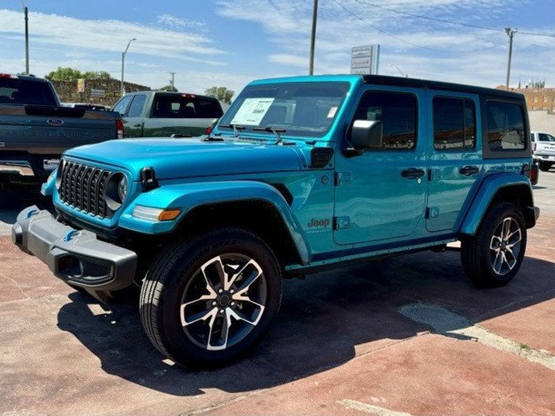 2024 Jeep Wrangler 4-door Sport S 4xe in a Bikini Pearl Coat exterior color and Blackinterior. Matthews Chrysler Dodge Jeep Ram 918-276-8729 cyclespecialties.com 