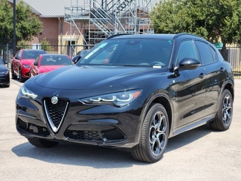 2024 Alfa Romeo Stelvio Ti in a Vulcano Black Metallic exterior color and Blackinterior. Northside Imports Houston 281-475-4549 northsideimportshouston.com 