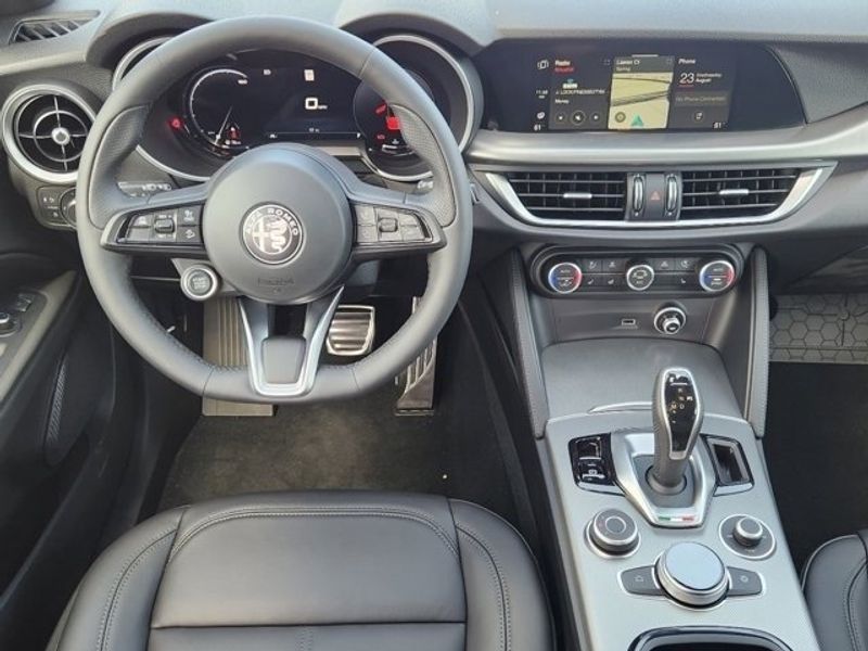 2024 Alfa Romeo Stelvio Ti in a Alfa Rosso exterior color and Blackinterior. Northside Imports Houston 281-475-4549 northsideimportshouston.com 