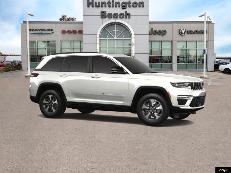 2023 Jeep Grand Cherokee 4xe Base 4x4 in a Bright White exterior color and Global Blackinterior. BEACH BLVD OF CARS beachblvdofcars.com 