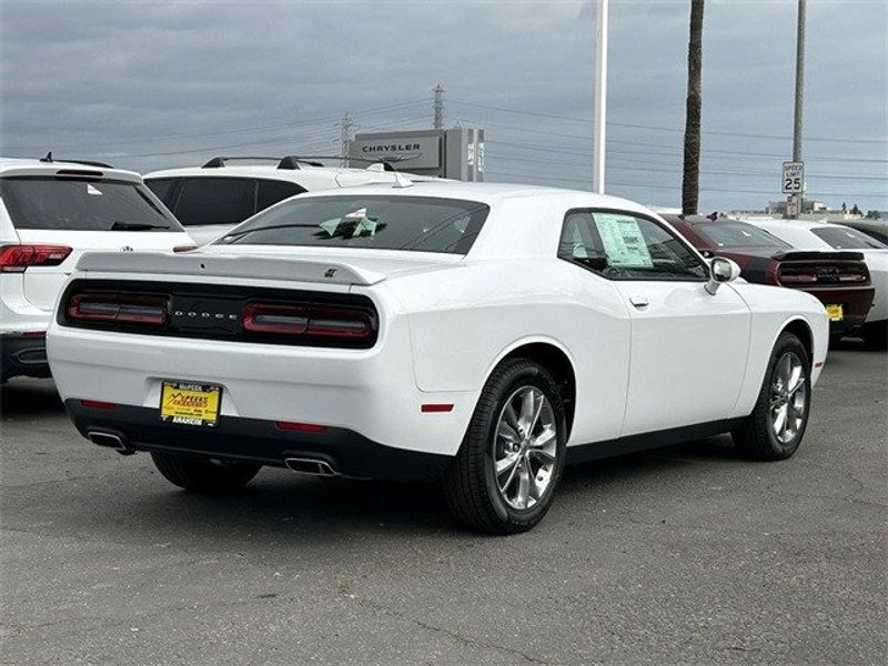 2023 Dodge Challenger SXT Awd in a White Knuckle exterior color and Blackinterior. McPeek