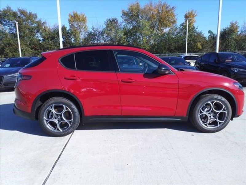 2024 Alfa Romeo Stelvio Sprint in a Alfa Rosso exterior color and Blackinterior. Northside Imports Houston 281-475-4549 northsideimportshouston.com 