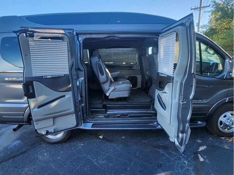 2021 Ford Transit-150 Cargo Van  in a Carbonized Gray Metallic exterior color and Graphiteinterior. Paul Sherry Chrysler Dodge Jeep RAM (937) 749-7061 sherrychrysler.net 