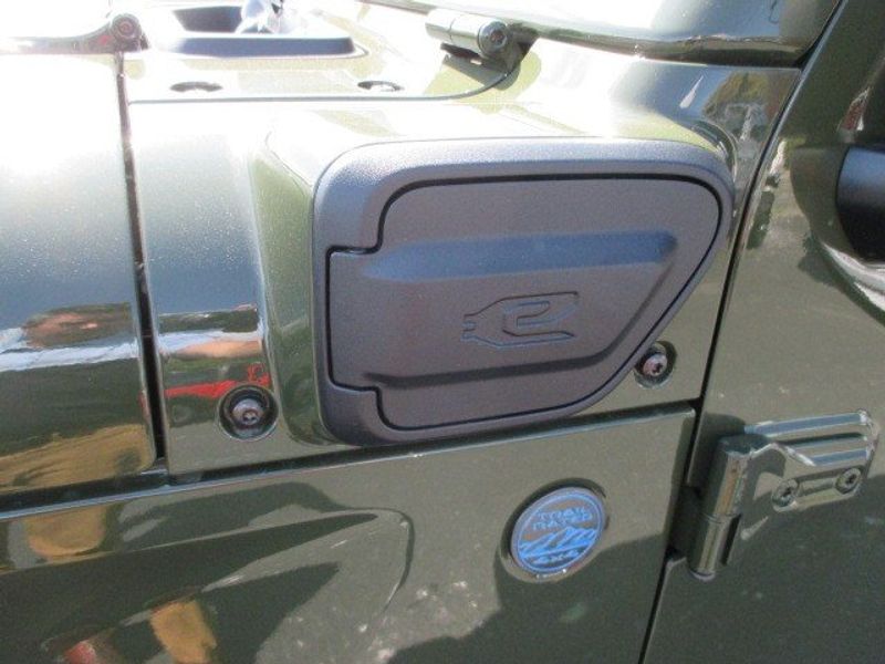 2024 Jeep Wrangler 4-door Rubicon 4xe in a Sarge Green Clear Coat exterior color and Blackinterior. Oak Harbor Motors Inc. 360-323-6434 ohmotors.com 