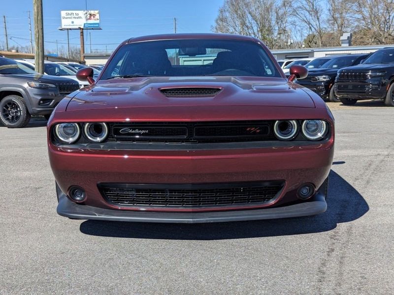 2023 Dodge Challenger R/T Scat Pack in a Octane Red exterior color and Blackinterior. Johnson Dodge 601-693-6343 pixelmotiondemo.com 