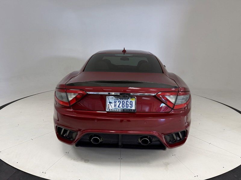 2018 Maserati GranTurismo MC in a Rosso Trionfale Metallic exterior color and Bianco Pregiatointerior. Karma Newport Beach (844) 527-6262 karmanb.com 