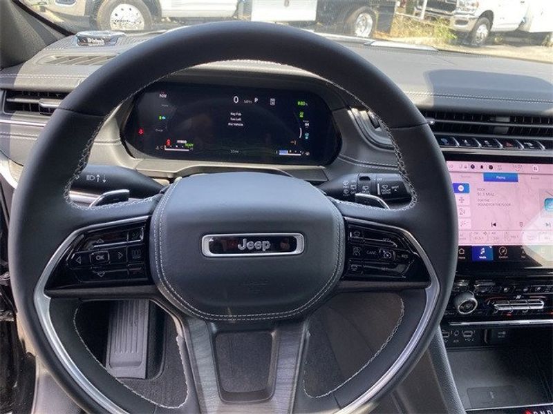 2023 Jeep Grand Cherokee Overland 4xe in a Diamond Black Crystal Pearl Coat exterior color and Global Blackinterior. McPeek