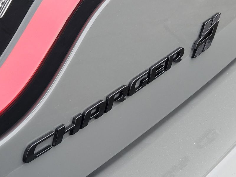 2023 Dodge Charger SXT Awd in a Destroyer Gray exterior color and Blackinterior. Elder Chrysler Dodge Jeep Ram 9032920419 elderchryslerdodgejeep.com 