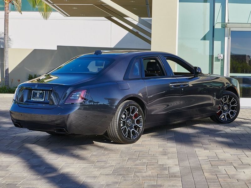 2024 Rolls-Royce Ghost  in a Gunmetal exterior color and Forge Yellowinterior. SHELLY AUTOMOTIVE shellyautomotive.com 