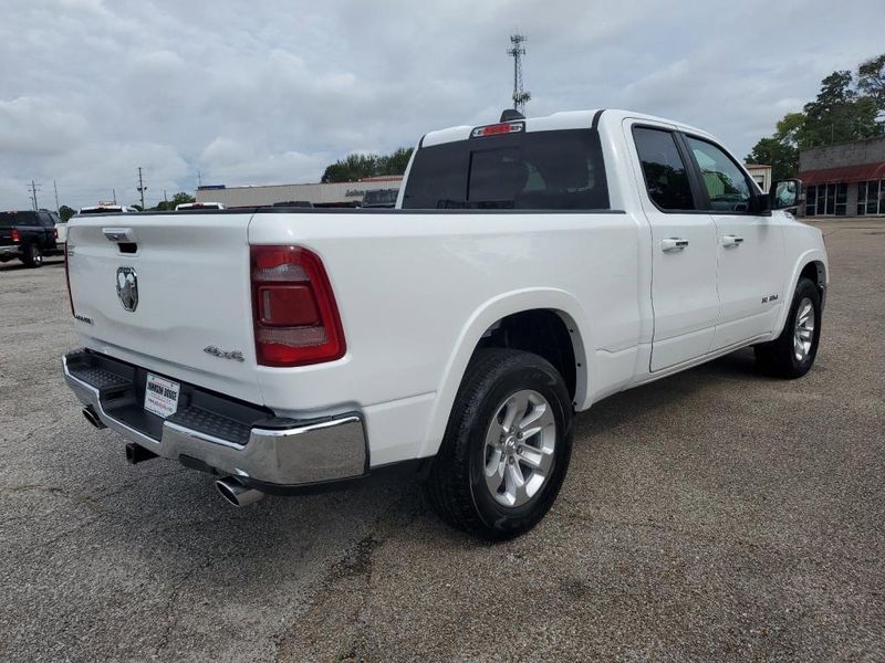 2020 RAM 1500 Laramie in a Bright White Clear Coat exterior color and Blackinterior. Johnson Dodge 601-693-6343 pixelmotiondemo.com 