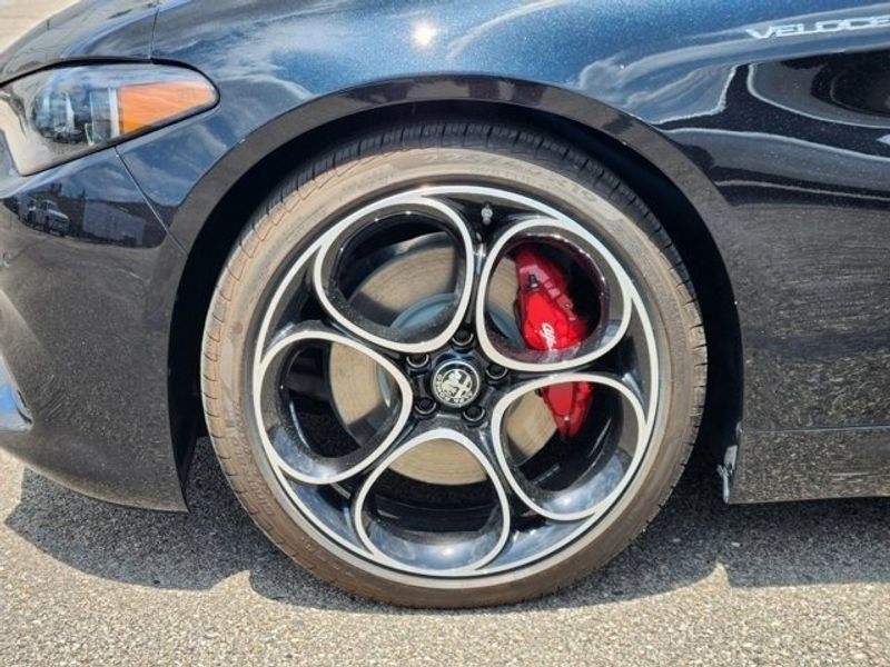 2024 Alfa Romeo Giulia Veloce in a Vulcano Black Metallic exterior color and Blackinterior. Northside Imports Houston 281-475-4549 northsideimportshouston.com 